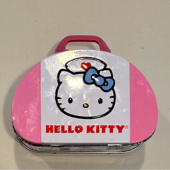 Hello Kitty by Sanrio | 2014 small Nurse Hello Kitty tin. - Picture 1 of 14